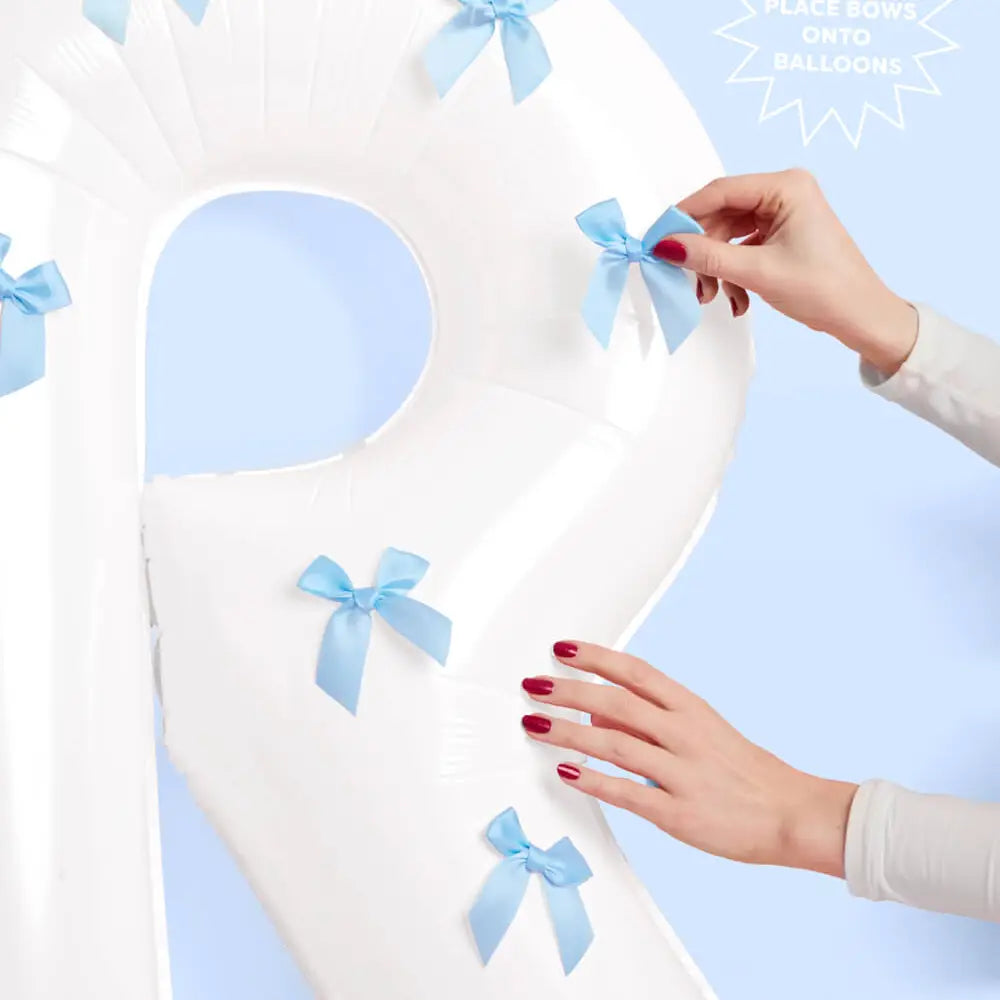 White Bride Balloons With Blue Bows